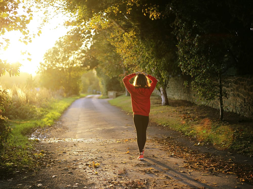 A woman walking outdoors