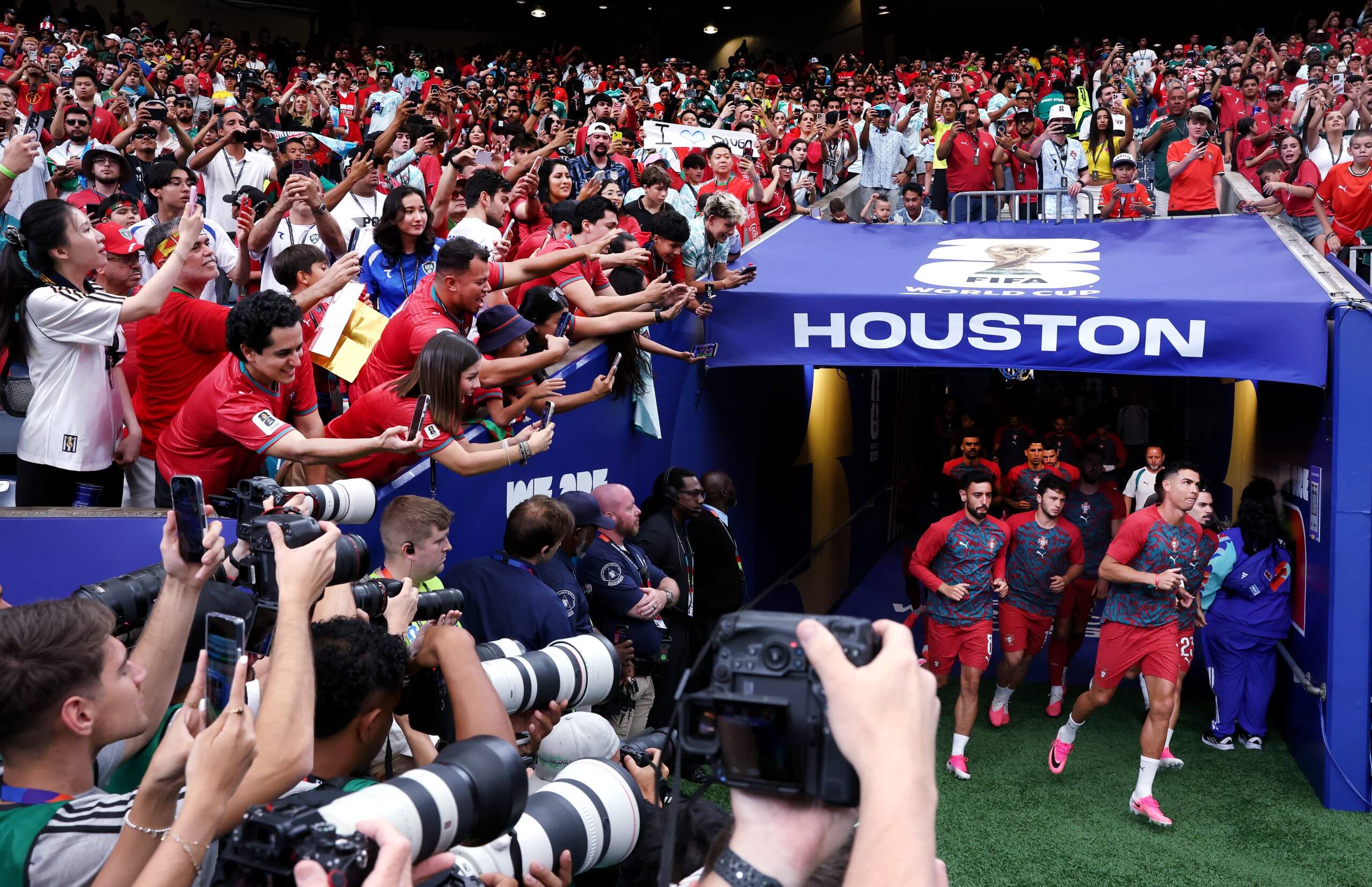 Captain Cristiano Ronaldo leads Portugal on to the pitch for the pre-match warm up at Houston Stadium