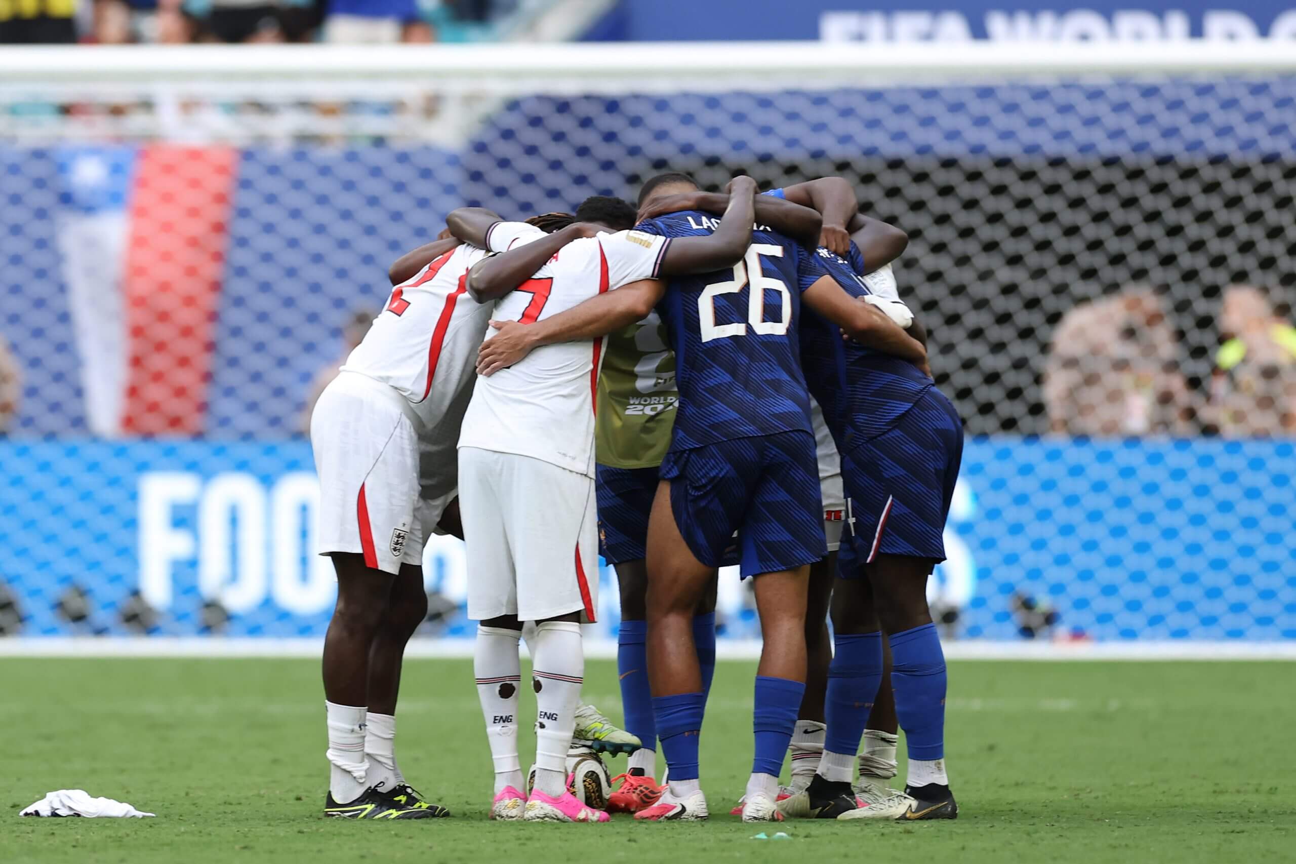England and France unite in prayer after the Bronze Final