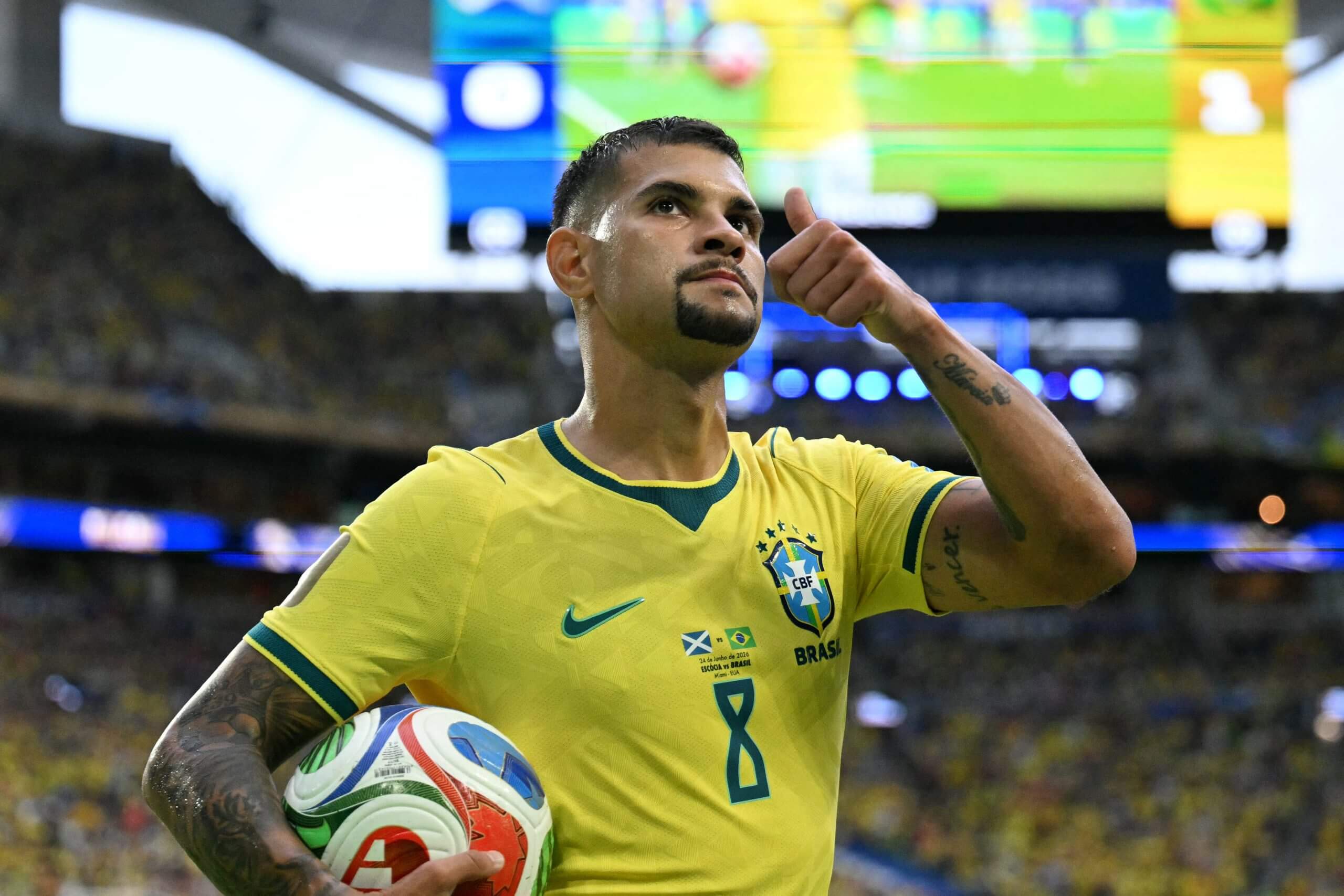 Image of Bruno Guimares playing for Brazil and giving the thumbs up