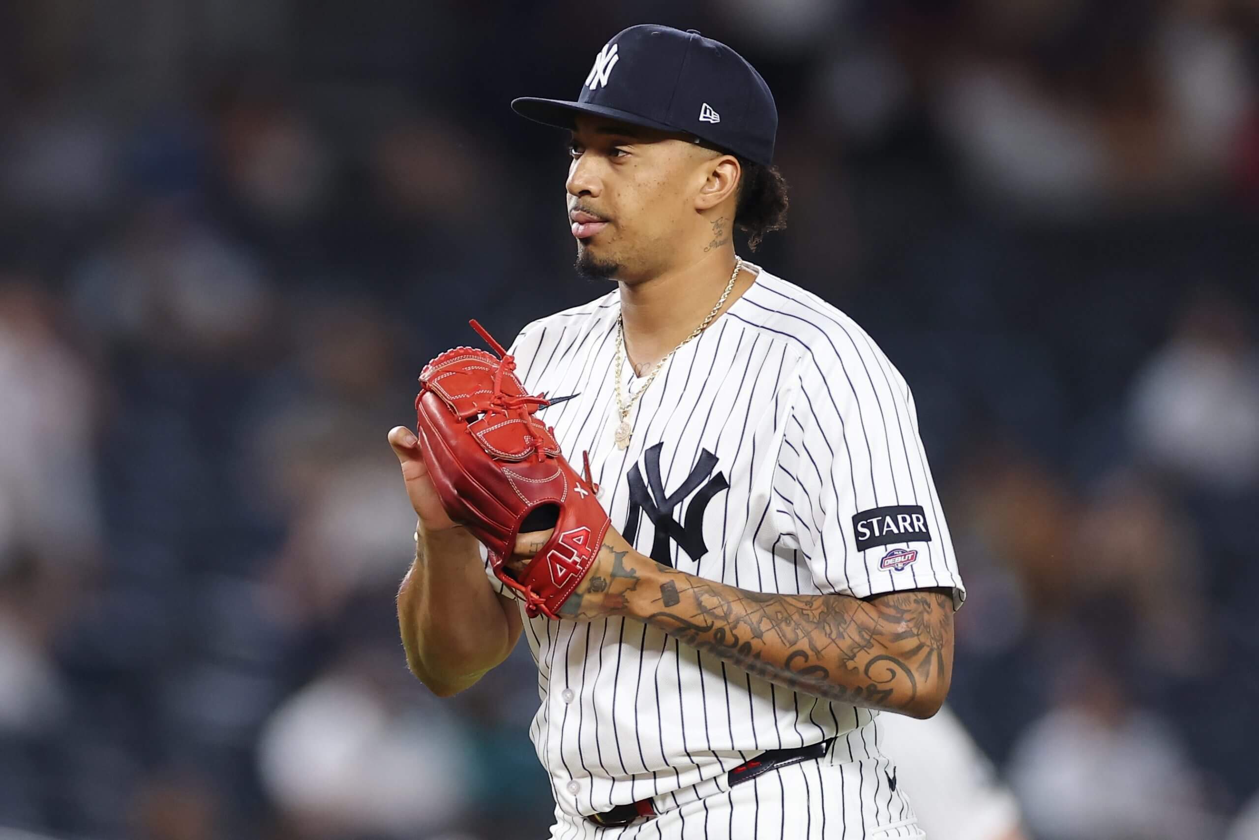 Yovanny Cruz #96 of the New York Yankees reacts after making his Major League Baseball debut during the eighth inning against the Toronto Blue Jays at Yankee Stadium on May 20, 2026 in the Bronx borough of New York City. 